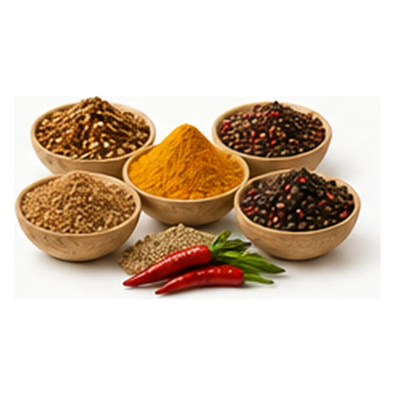 Bowls of ground and whole spices with dried chillies